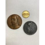 A bronze WWI medallion of Lord Kitchener by Legastelois,