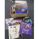 A box containing a small quantity of LPs to include Marillion, Prince, Eurythmics classical,