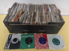 A box containing a large quantity of vinyl 7" singles to include Cliff Richards, Rolling Stones,