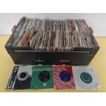 A box containing a large quantity of vinyl 7" singles to include Cliff Richards, Rolling Stones,