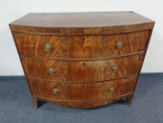 A Regency mahogany bowfront chest of three drawers