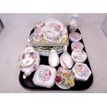 A tray containing assorted ceramics to include Wedgwood Meadow Sweet trinket dishes and lidded pots,