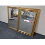 Two contemporary gilt beveled wall mirrors