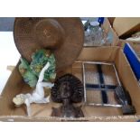 A box containing miscellany to include carved eastern figures, pottery foo dog,