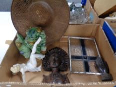 A box containing miscellany to include carved eastern figures, pottery foo dog,