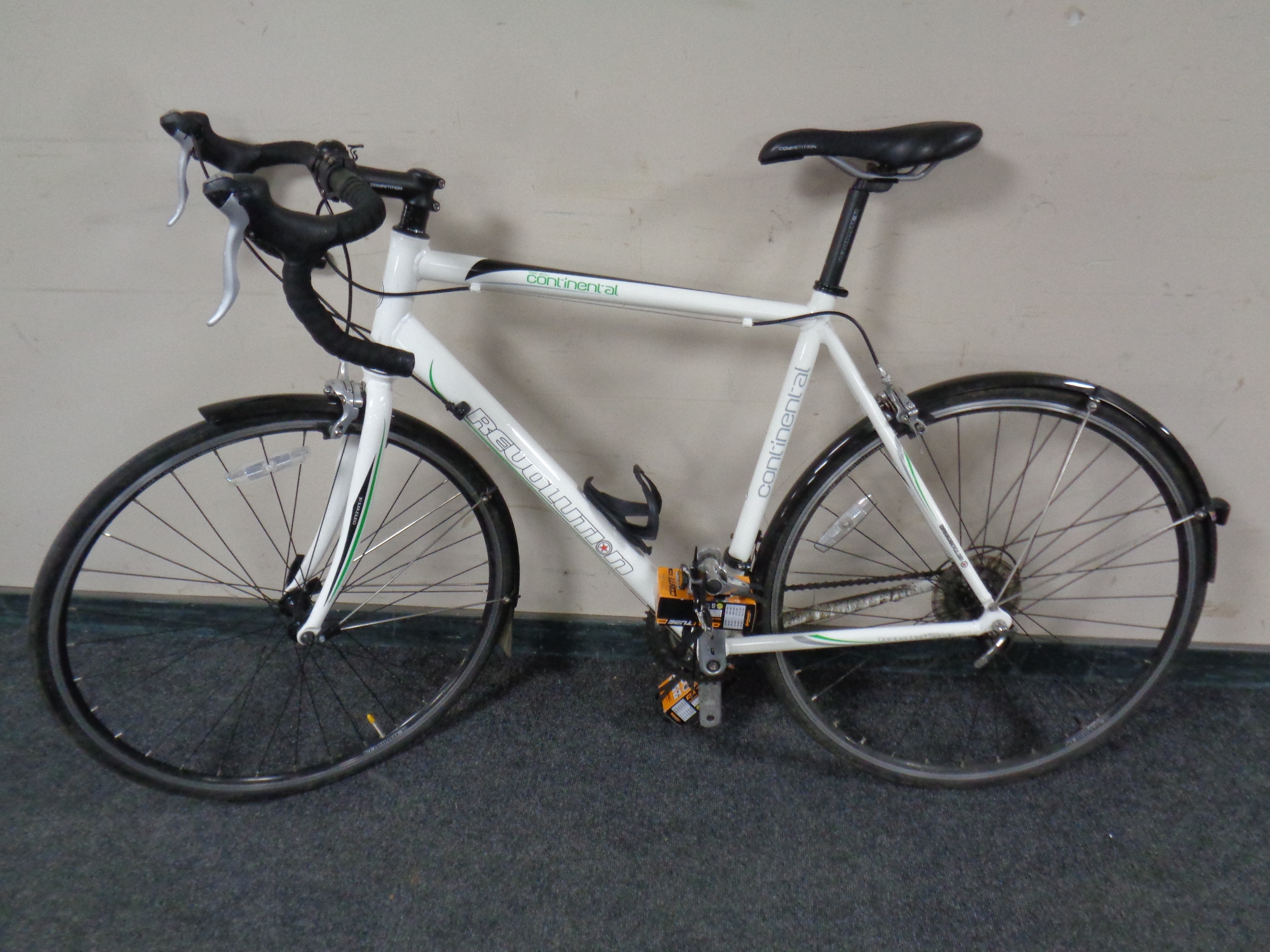 A Revolution 7005 alloy continental road bike with spare tyres.