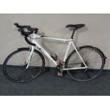 A Revolution 7005 alloy continental road bike with spare tyres.