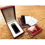 A must de Cartier gold-plated and black enamel lighter, circa 1989, stamped 62450T,