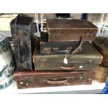 Five 20th century luggage cases.