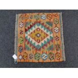 A Chobi kilim 46cm by 52cm