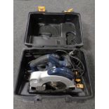 A cased Pro Electric hand saw