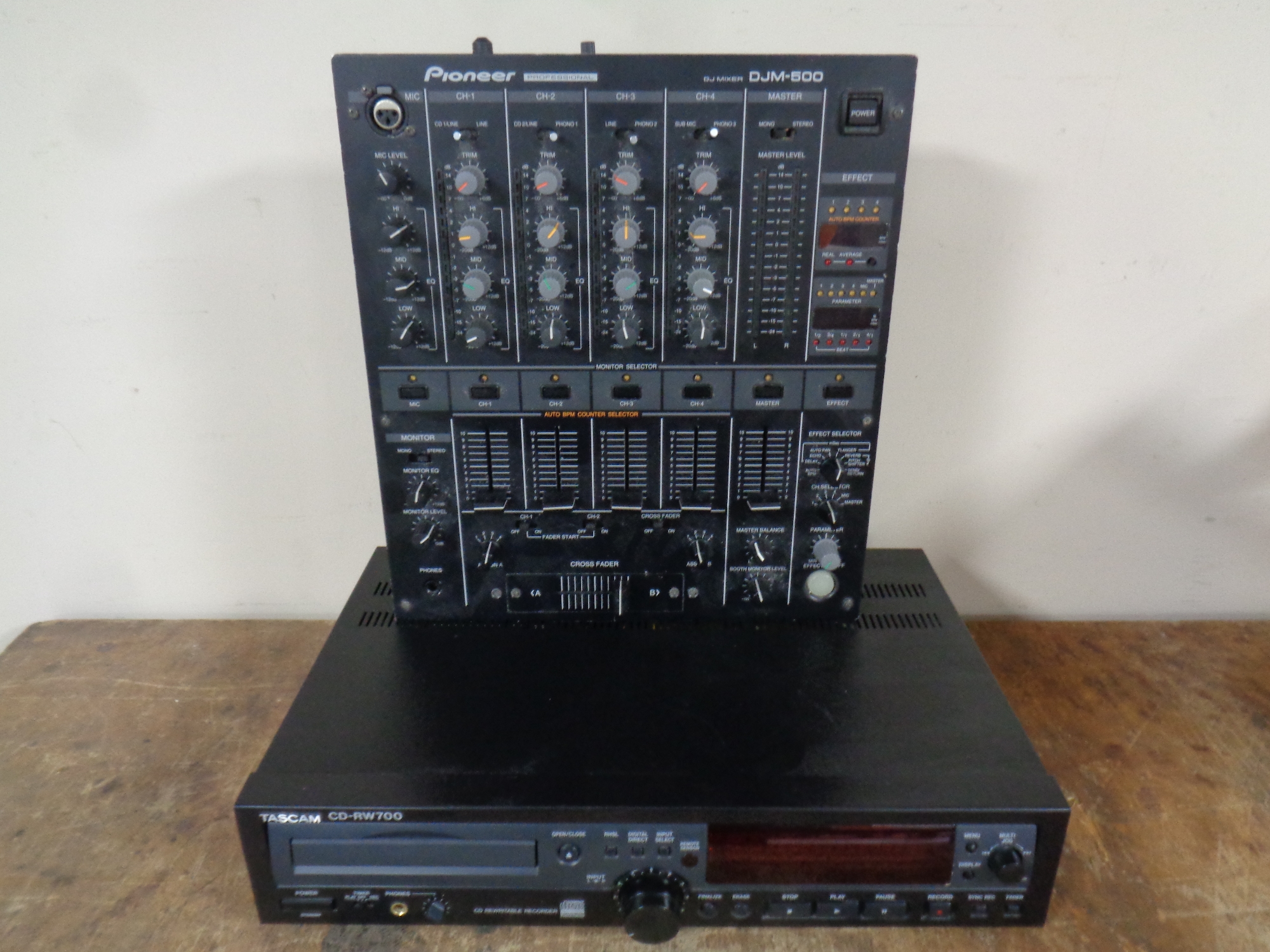 A Pioneer DGM-500 DJ mixer together with a Tascam CD RW700 CD re-writeable recorder