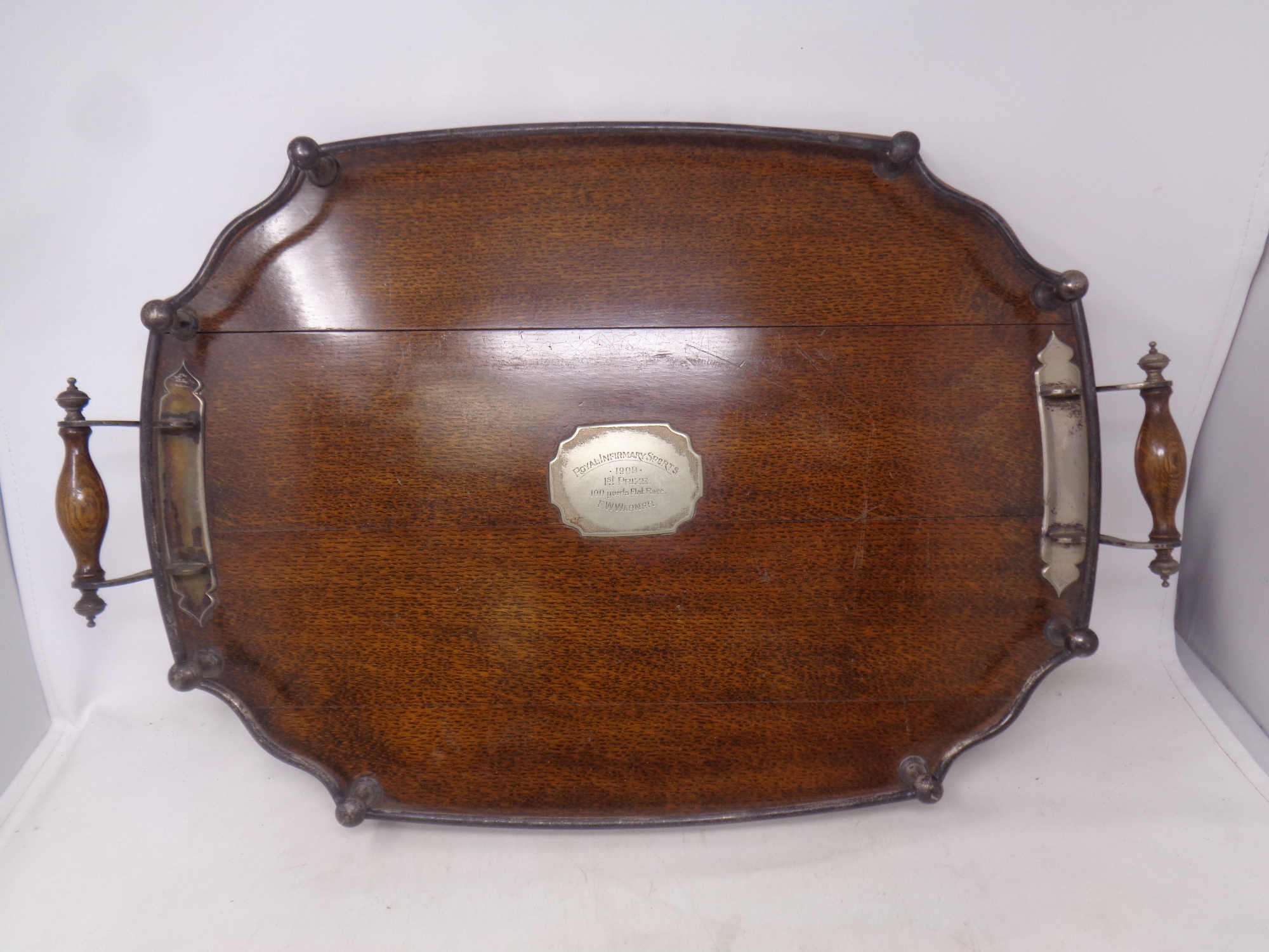 A Edwardian oak and silver plated serving tray