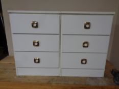 A pair of three drawer bedside chests (white)