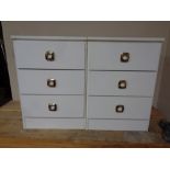 A pair of three drawer bedside chests (white)