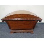 A 19th century mahogany dome-top cellaret with lead-lined interior.