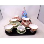 A tray containing assorted ceramics to include antique and later bone china tea ware to include