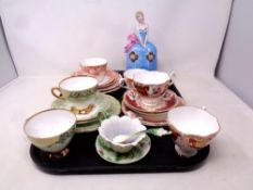 A tray containing assorted ceramics to include antique and later bone china tea ware to include