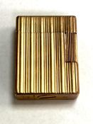 A vintage Dupont cigarette lighter