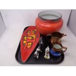 A tray containing assorted ceramics to include a shaped Poole plate, Poole dolphin,