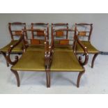 A set of six Regency style mahogany armchairs