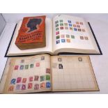 Two stamp albums containing 1000 world stamps 19th and 20th century together with a Stanley Gibbons