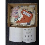 A box of an album and a quantity of loose world stamps to include stamp sheets