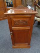 A 19th century walnut pot cupboard