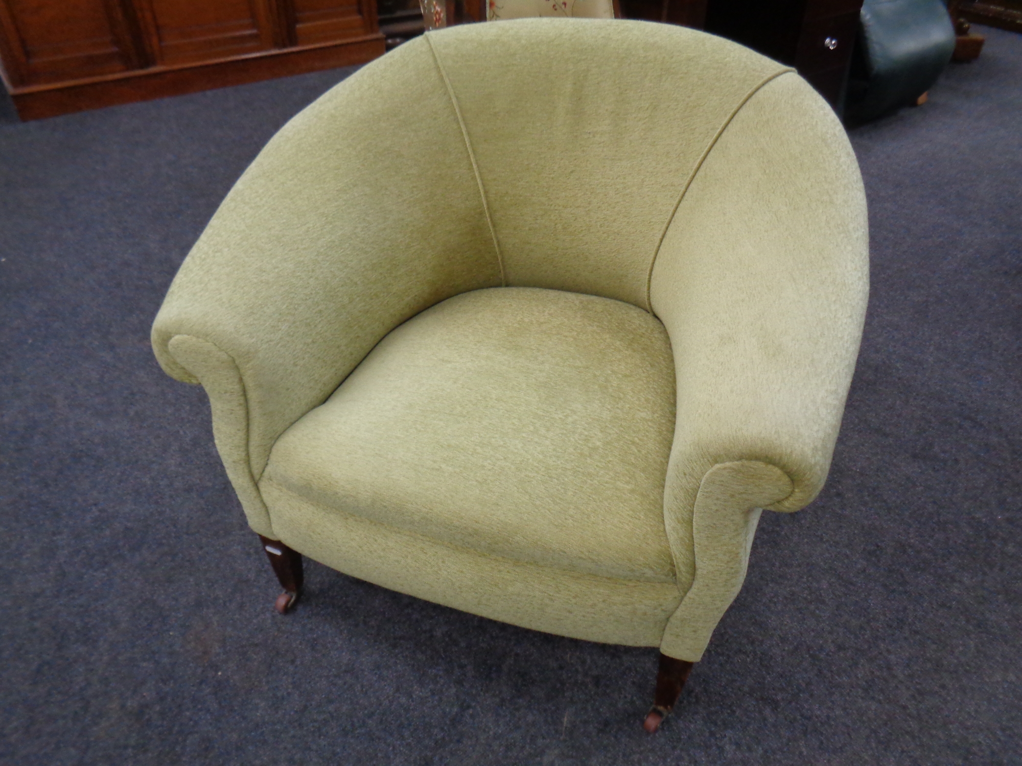 A 19th century mahogany framed tub armchair (re-upholstered)