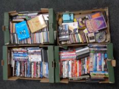Four boxes of a quantity of assorted DVD's and cassette tapes