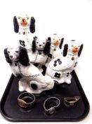 A tray of two pairs of china spaniel figures together with one further and three wristwatches by