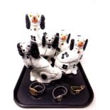 A tray of two pairs of china spaniel figures together with one further and three wristwatches by