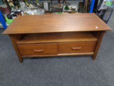 A contemporary television stand fitted two drawers in a teak finish