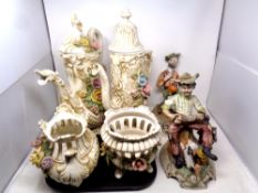 Two Capodimonte figures together with a tray of four further pieces of Capodimonte flower encrusted