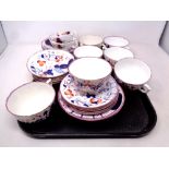 A tray of twenty-three pieces of antique Gaudy Welsh tea china together with two further similar