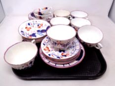 A tray of twenty-three pieces of antique Gaudy Welsh tea china together with two further similar