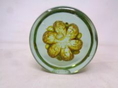 A Mdina glass paperweight with central flower (height 11.