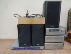 A Denon three-piece micro hifi system together with a pair of JVC speakers,