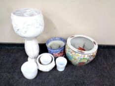 A Chinese style fish bowl planter (a/f) together with further plant pots and a jardiniere stand.