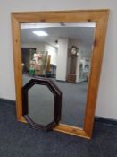 A pine framed mirror together with a further Edwardian octagonal framed mirror