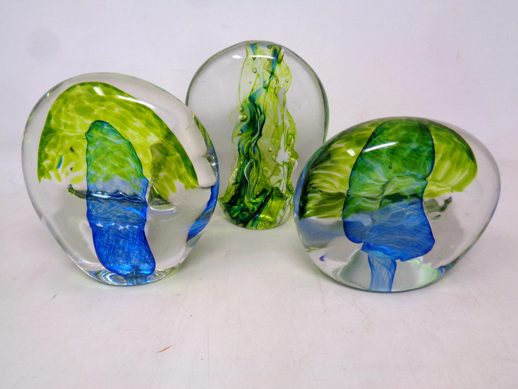 Three art glass paperweights