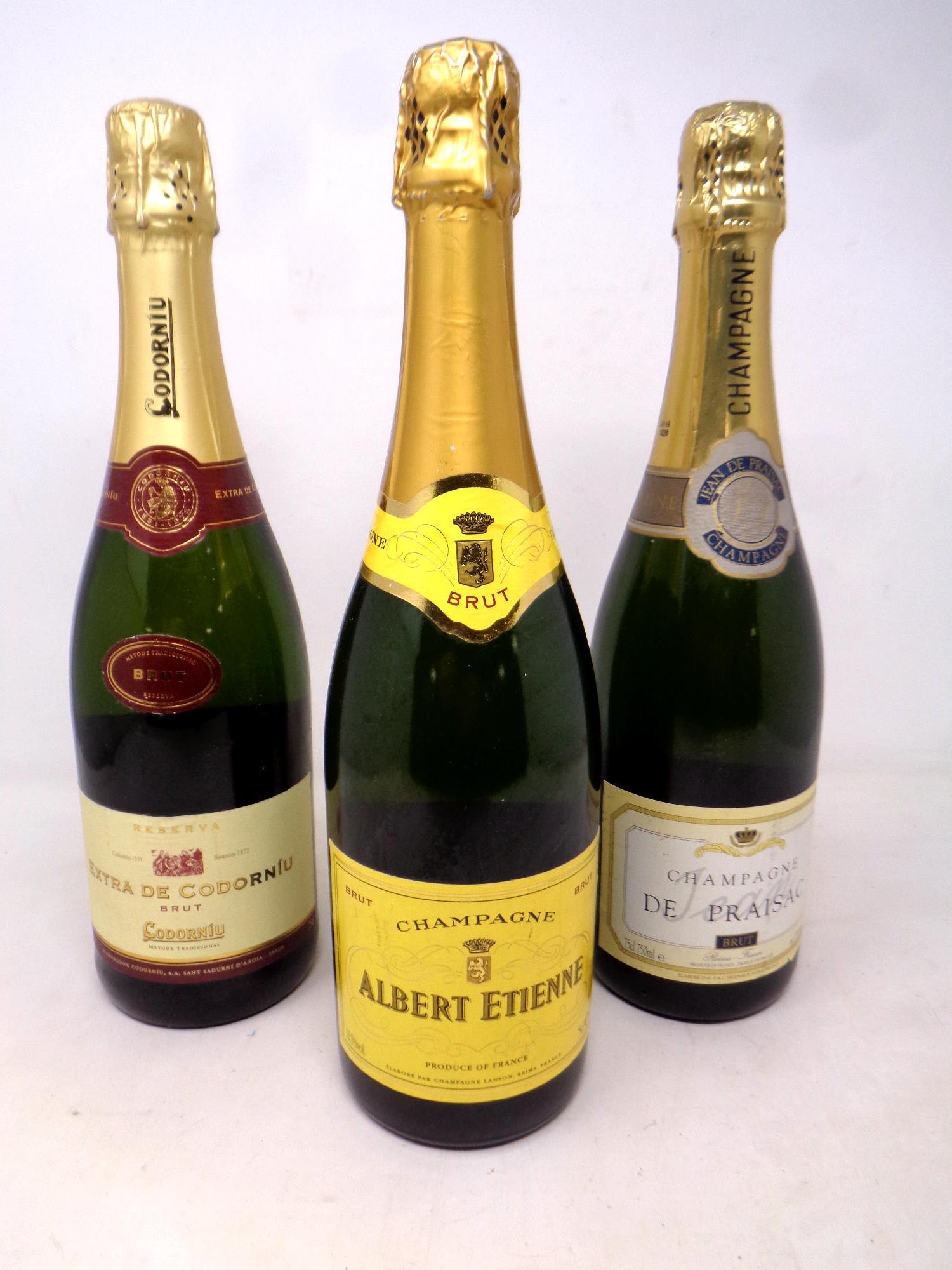 Three bottles of Champagne to include De Praisac,