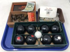 A tray of boxed carpet bowls, cigar box and tub of pre-decimal coins,