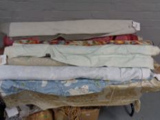 Eight rolls of upholsterers fabric