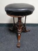 An early Victorian carved rosewood circular piano stool (a/f) CONDITION REPORT: One