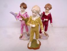 Three Royal Worcester 'Parakeet' figures number 3087 modelled by F.C.