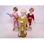 Three Royal Worcester 'Parakeet' figures number 3087 modelled by F.C.