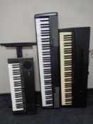 Three electric keyboards by Casio, Technics and Yamaha,