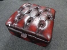 A Thomas Lloyd oxblood buttoned leather storage footstool