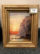 G A MacDonnel : Coastline Cliffs at Sunset, oil on canvas, 20 cm x 15 cm, inscribed verso, framed.